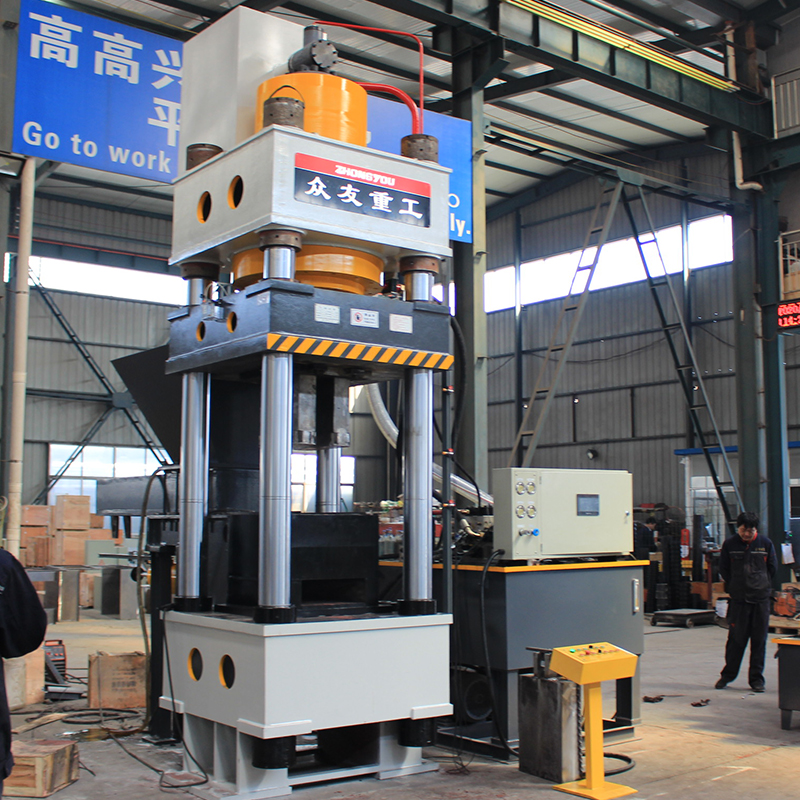 630吨碳末成型一出二液压机
